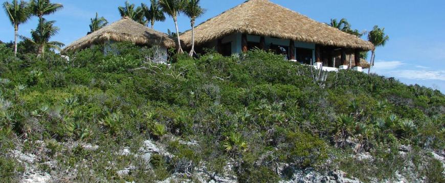 Thatched house  on a Hill Overlooking the Ocean in Bahamas