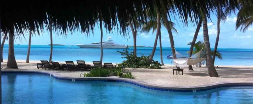 Bautiful ocean view from inside palm thatch pool bar