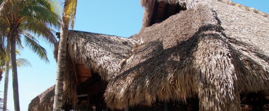 large thatched dining pavilion on exclusive island resort