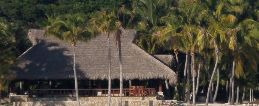 THATCHED DINING PAVILION ON EXOTIC ISLAND